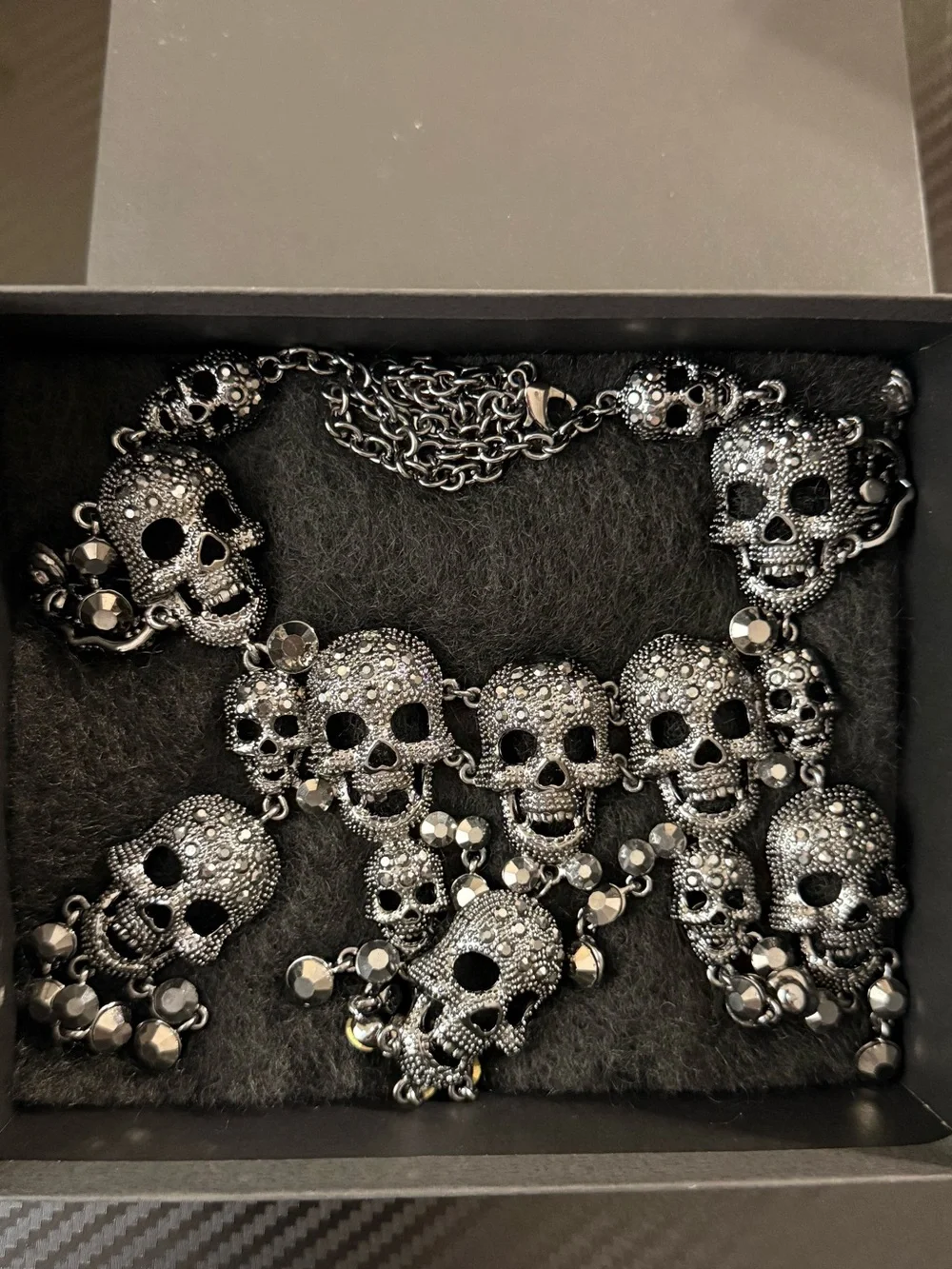 Natasha Couture Gunmetal Rhinestone Gothic Skull Dangle Statement Necklace